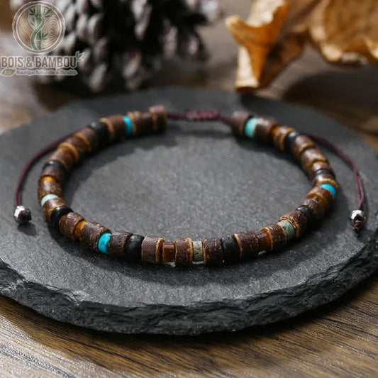 Bracelet extensible perles de bois rétro bohème modèle 1 rondelles brun doré turquoise cordon bordeaux sur ardoise noire