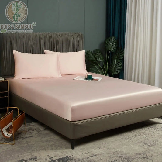 Drap-housse bambou rose sur lit simple situation chambre