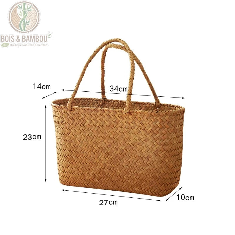 Panier en bambou tresse dimensions 1. Infographie d'un cabas en bambou de 27 cm de long, 10 cm de large et 23 cm de haut. Les anses mesurent 14 cm de large pour une hauteur totale de 34 cm.