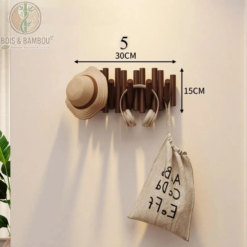 Patere Piano en Bois Massif 5 crochets 30 cm fonce. Porte-manteau mural en bois foncé aux tiges inégales, supportant un chapeau, un casque et un sac, avec dimensions 30x15 cm indiquées.