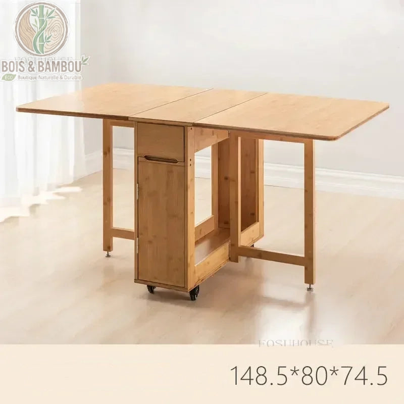 Table a manger pliante en bambou dimension table naturel. Table modulable en bambou clair sur roulettes, présentée en position ouverte avec ses dimensions de 148,5 x 80 x 74,5 cm.