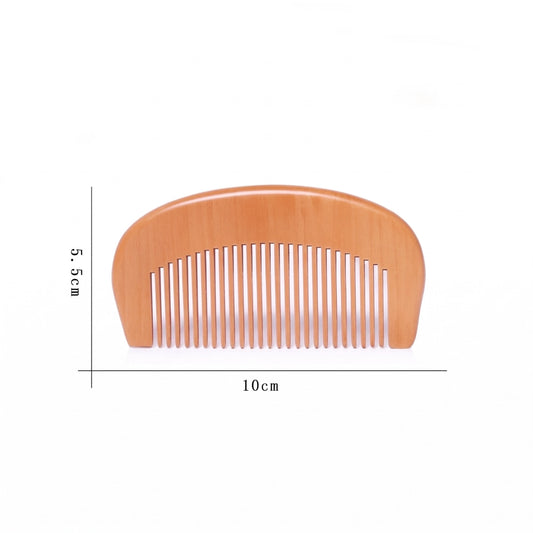 Peigne de poche en bois naturel avec dimensions annotées, 10 cm de largeur sur 5,5 cm de hauteur
