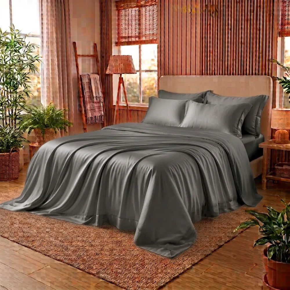Draps en bambou gris anthracite et housse de couette dans une chambre naturelle