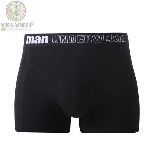 Boxer en fibre de bambou taille moyenne. Un boxer noir sobre et élégant avec une ceinture élastique marquée "man UNDERWEAR" en lettres blanches, présenté sur un fond blanc épuré.