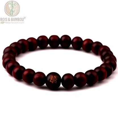 Bracelet bouddhiste bois de santal coloris rouge perles gravées Bouddha 8mm