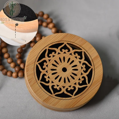 Brûleur encens bambou rond motif mandala solaire, gravure ajourée fond feutrine noire
