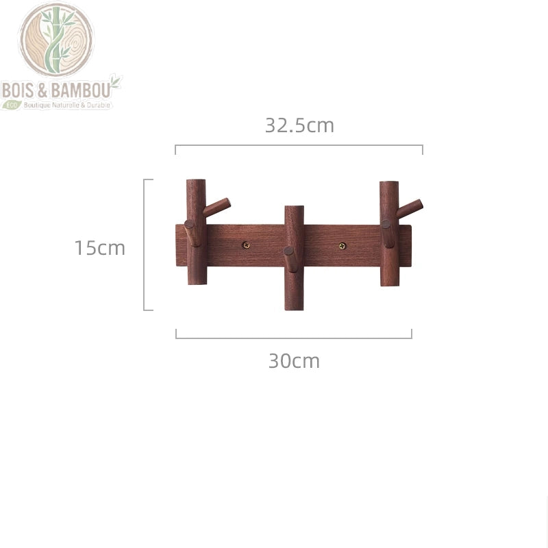 Cintre Mural en Bois 3 crochets marron. Un porte-manteau mural en bois sombre de 32,5 cm avec trois crochets multidirectionnels, présentant ses dimensions techniques sur fond blanc.