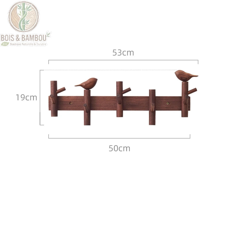 Cintre Mural en Bois 5 crochets marron 2 deco. Un porte-manteau mural en bois sombre de 53 cm avec cinq crochets et deux oiseaux décoratifs, affichant ses mesures sur fond blanc.