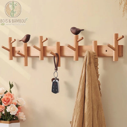 Cintre Mural en Bois : un portemanteau naturel au design de branches et d'oiseaux sculptés. Idéal pour organiser clés et vêtements avec une touche scandinave élégante et durable.