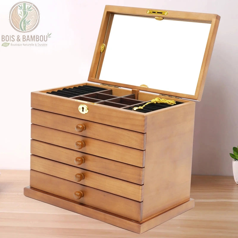 Coffret à bijoux 6 couches en bois massif avec grand miroir intérieur et compartiments de rangement veloutés. Fabrication artisanale robuste dotée de cinq tiroirs et d'un verrou doré pour sécuriser avec élégance une vaste collection.