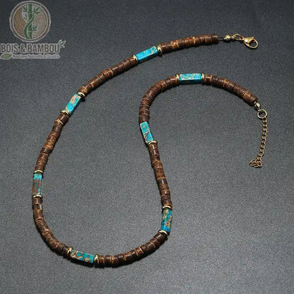 collier modèle 11 rondelles bois brun pierres turquoise bleue vive anneaux or fond gris