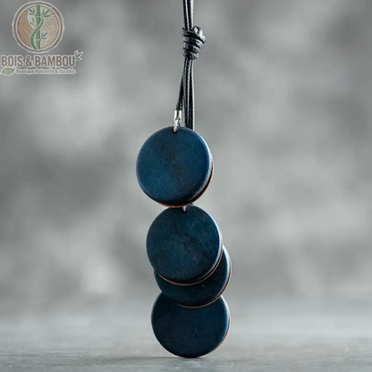 collier long bois vintage 4 disques colorés bleu pétrole mat en cascade sur cordon noir réglable