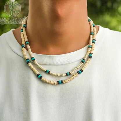 collier ras du cou perles disques bois ivoire accents turquoise et noir porté en double rang sur torse