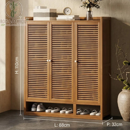 Etagere a chaussures en bambou au design japonais 110 88 32 avec trois portes à lattes et espace de rangement inférieur.