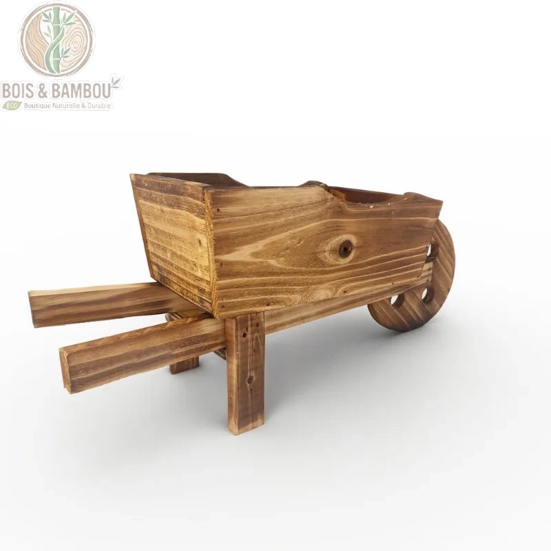 Vue de côté jardinière brouette bois brûlé, roue et brancards apparents, style campagne