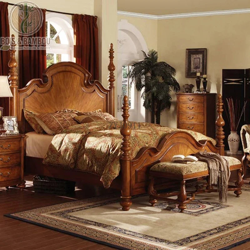 Lit en Acajou Massif Traditionnel style c : somptueux lit à colonnes torsadées en bois massif sculpté. Un design impérial et classique pour une chambre à coucher de prestige.