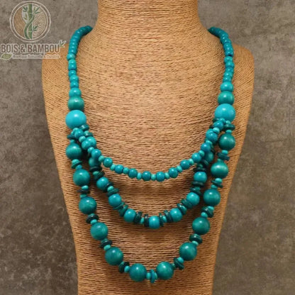 long collier perles bois 3 rangs coloris bleu paon turquoise présentoir raphia style bohème