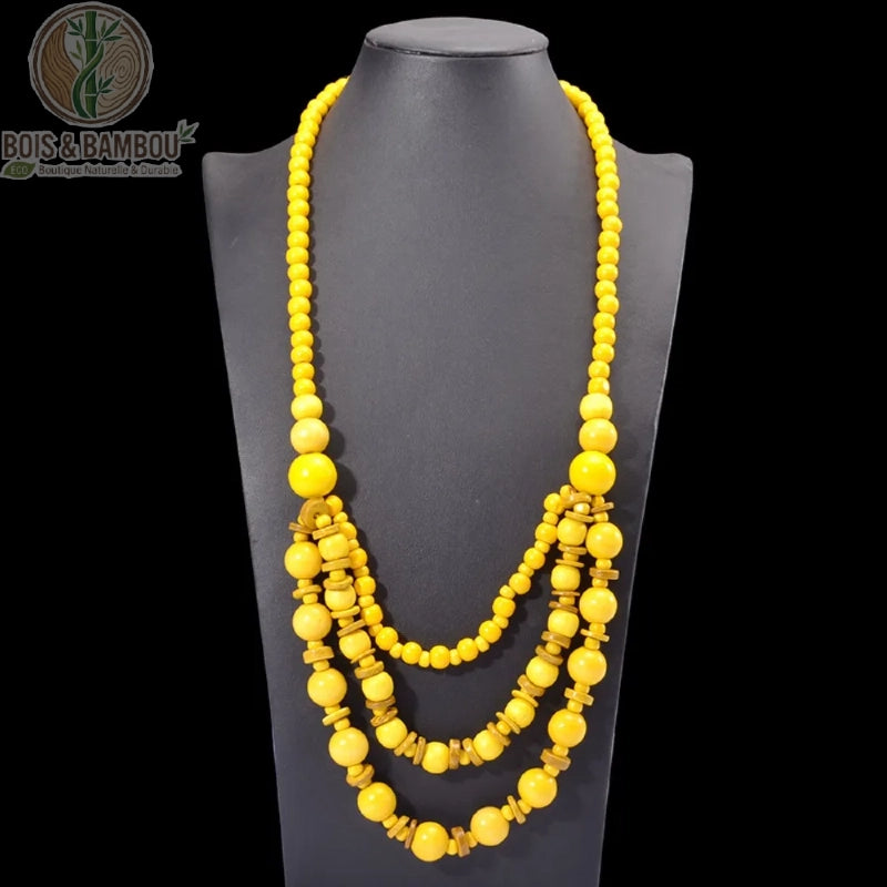 long collier perles bois 3 rangs coloris jaune vif perles rondes et disques fond noir