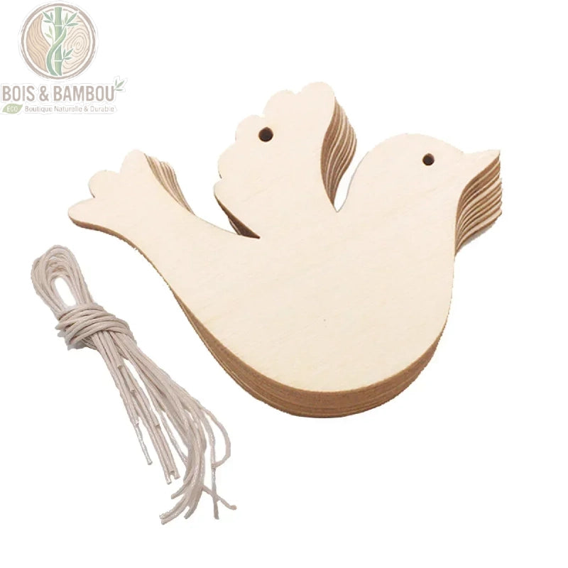 Ornement noël bois colombe en vol ailes ouvertes corde coton