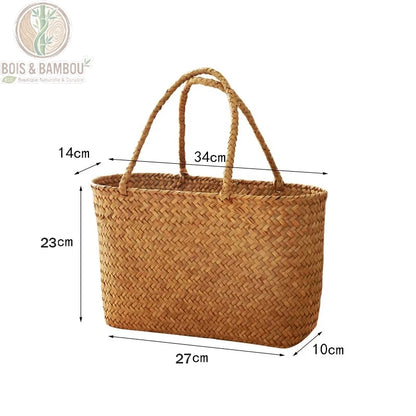 Panier en bambou tresse dimensions 1. Infographie d'un cabas en bambou de 27 cm de long, 10 cm de large et 23 cm de haut. Les anses mesurent 14 cm de large pour une hauteur totale de 34 cm.