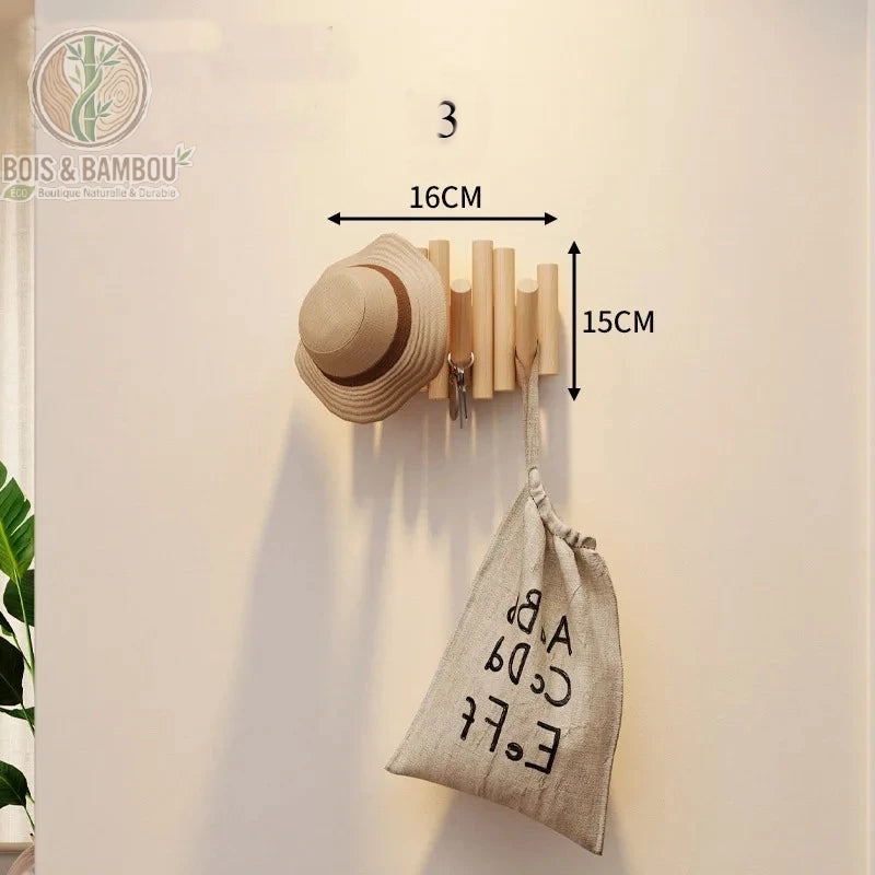 Patere Piano en Bois Massif 3 crochets 16 cm claire. Petit porte-manteau mural en bois clair avec tiges de hauteurs variées, supportant un chapeau, des clés et un sac, avec dimensions.
