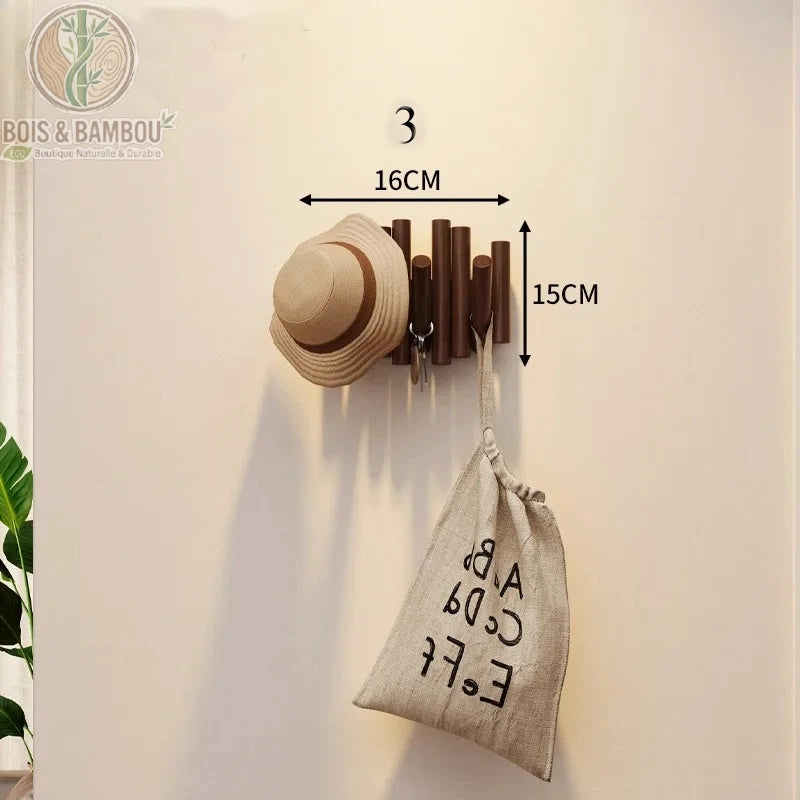 Patere Piano en Bois Massif 3 crochets 16 cm fonce. Petit porte-manteau mural en bois foncé avec tiges de hauteurs variées, supportant un chapeau, des clés et un sac, avec dimensions.