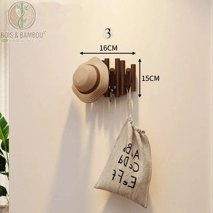 Patere Piano en Bois Massif 3 crochets 16 cm fonce. Petit porte-manteau mural en bois foncé avec tiges de hauteurs variées, supportant un chapeau, des clés et un sac, avec dimensions.