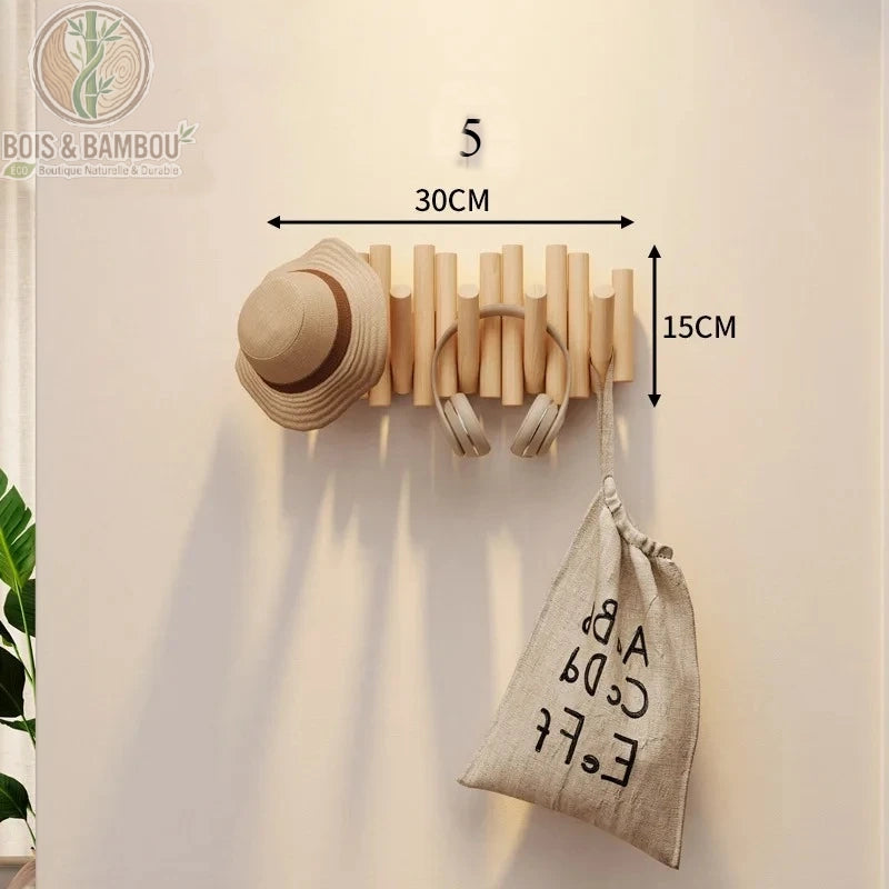 Patere Piano en Bois Massif 5 crochets 30 cm claire. Porte-manteau mural en bois clair aux tiges inégales, supportant un chapeau, un casque et un sac, avec dimensions 30x15 cm indiquées.