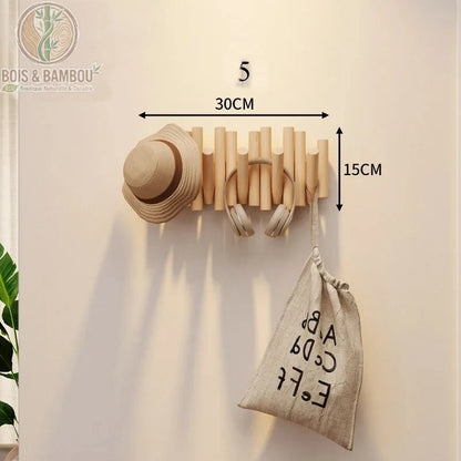 Patere Piano en Bois Massif 5 crochets 30 cm claire. Porte-manteau mural en bois clair aux tiges inégales, supportant un chapeau, un casque et un sac, avec dimensions 30x15 cm indiquées.