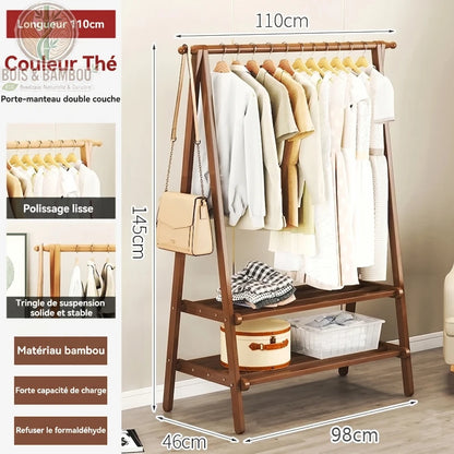 Portant a Vetements en Bambou the 110cm. Infographie d'un portant couleur thé de 145x110cm avec vêtements. Structure en bambou lisse, stable et écologique, sans formaldéhyde avec forte capacité de charge.