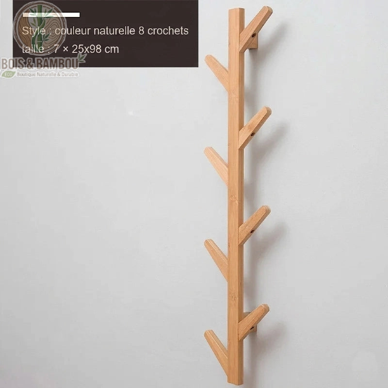 Porte manteau mural en bambou modele 8 crochets naturelle retro. Support mural vertical en bambou de couleur naturelle avec 8 crochets en épi, mesurant 7 x 25 x 98 cm pour un style épuré.