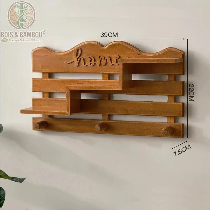 Porte manteau mural en bois massif avec etagere dimensions. Schéma technique d'un organiseur d'entrée gravé "Home" montrant ses mesures : 39 cm de large, 22 cm de haut et 7,5 cm de profondeur.