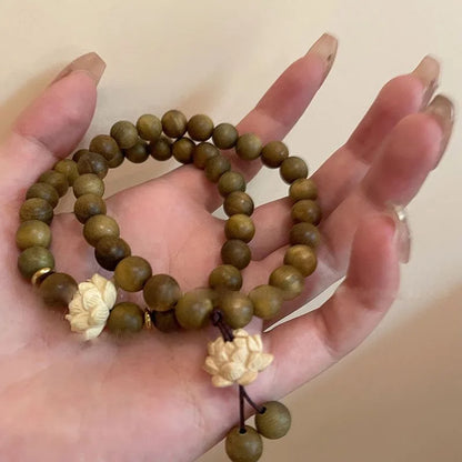 Bracelet en bois de santal vert et perle Lotus