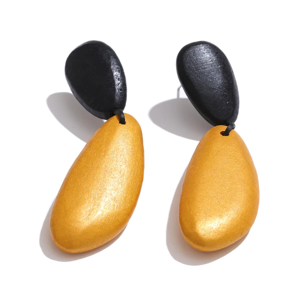 Boucles d'oreilles géométriques en bois noir et jaune
