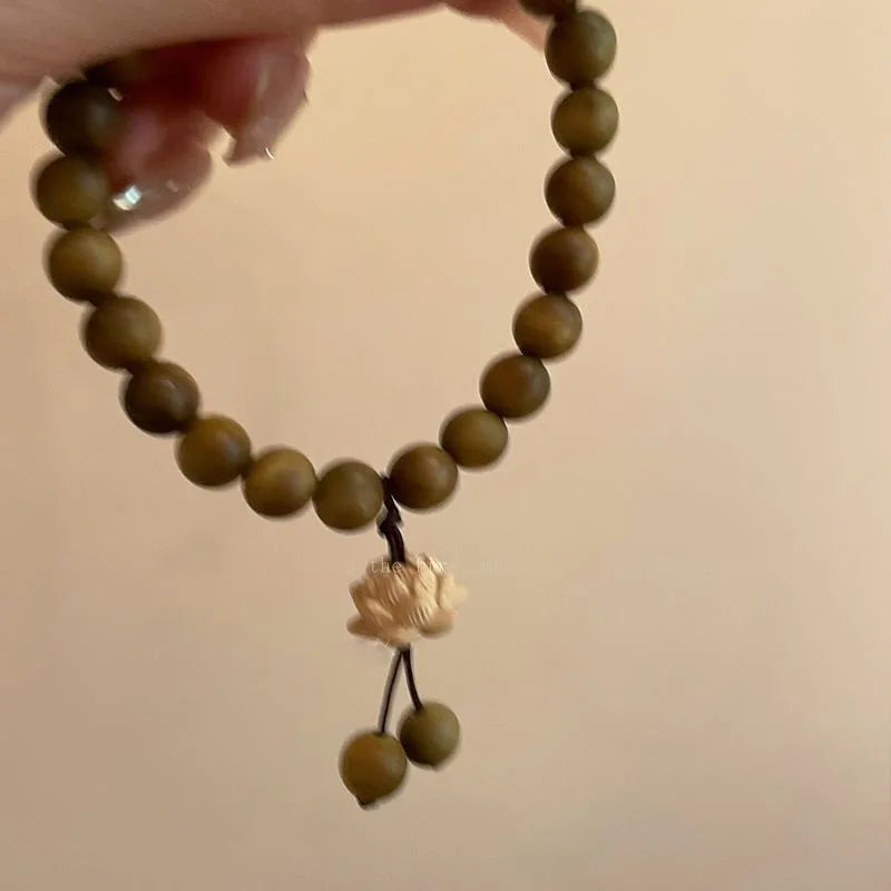 Bracelet en bois de santal vert et perle Lotus