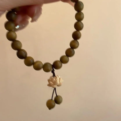 Bracelet en bois de santal vert et perle Lotus