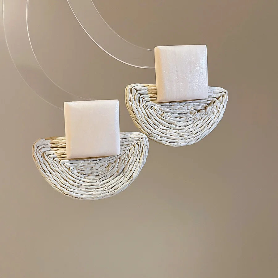 Boucles d'oreilles bohèmes en bois et raphia