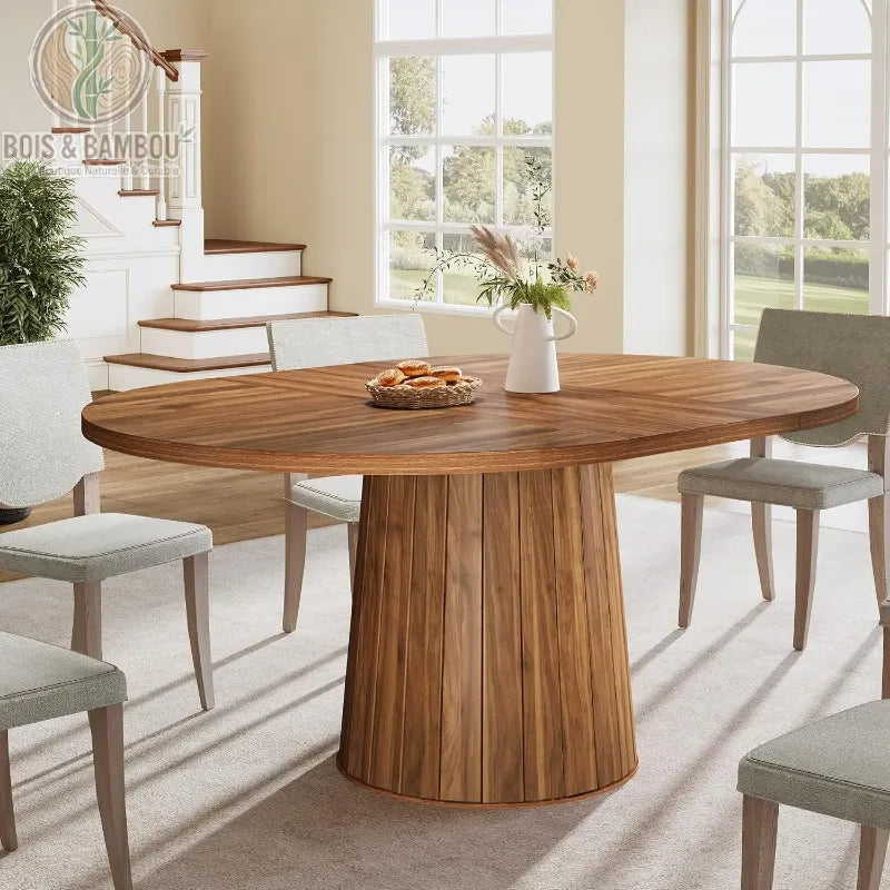 Table à manger ovale 6 personnes : table élégante en bois avec plateau aux veines marquées et pied central conique à lattes. Design scandinave chaleureux pour une salle à manger moderne.