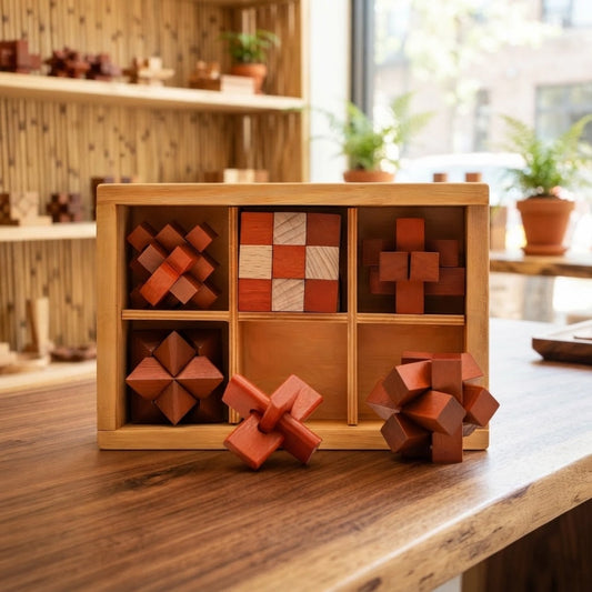 Coffret casse-tête en bois clair à six cases avec ses casse-têtes chinois en bois teinté rouge