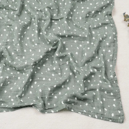 Couverture légère bébé en coton et bambou, motif pois blancs sur fond vert sauge