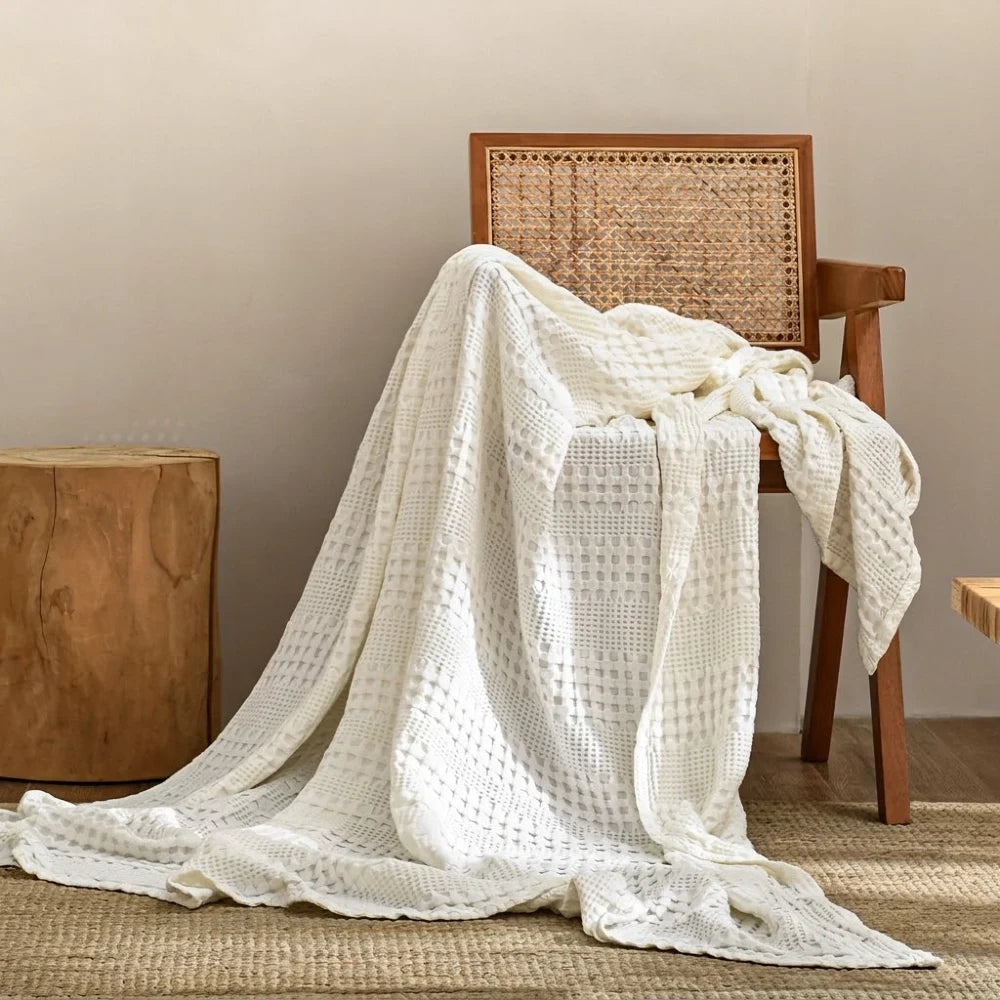 Gros plan sur le tissage nid d'abeille de la couverture bambou coton