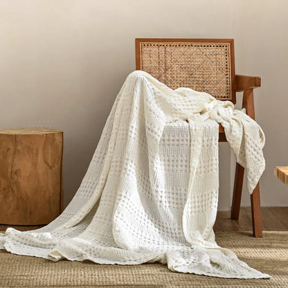 Gros plan sur le tissage nid d'abeille de la couverture bambou coton