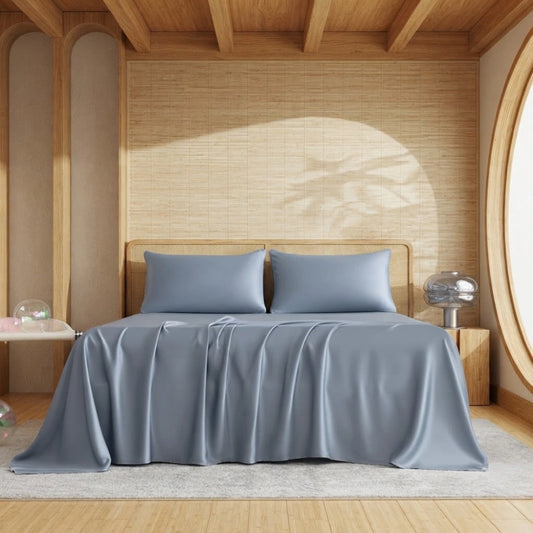 Ensemble de draps en bambou bleu ardoise sur un lit