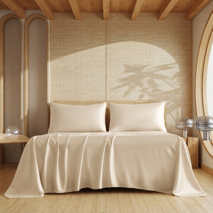 Ensemble de draps en bambou champagne clair sur un lit