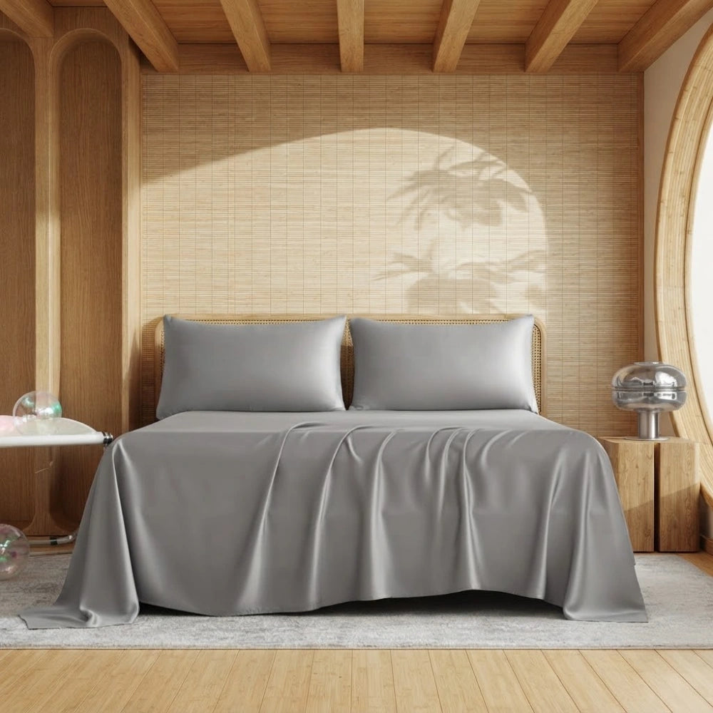 Ensemble de draps en bambou gris argent sur un lit