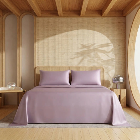 Ensemble de draps en bambou lilas sur un lit