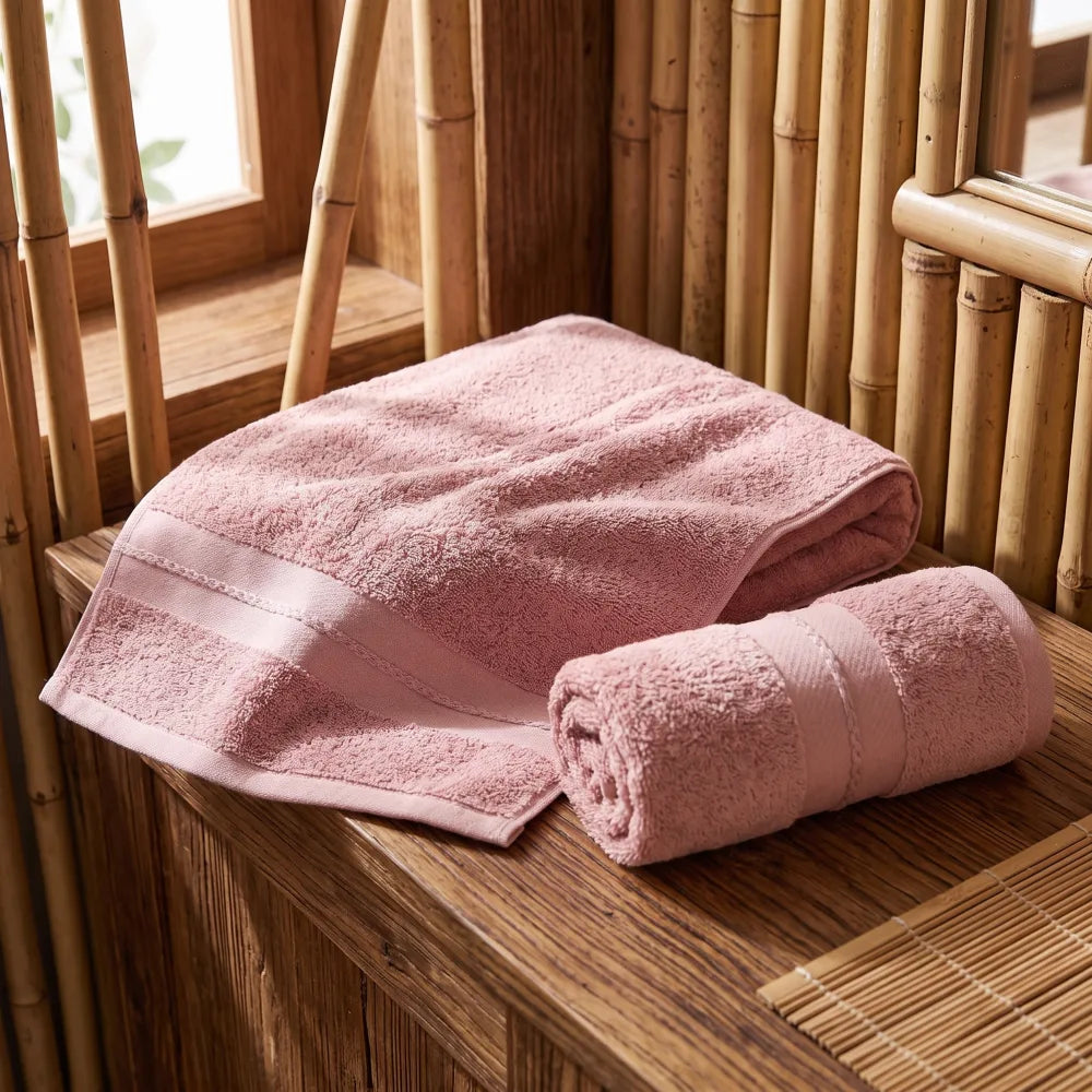 Serviette en bambou haut de gamme, coloris rose, bordure tissée