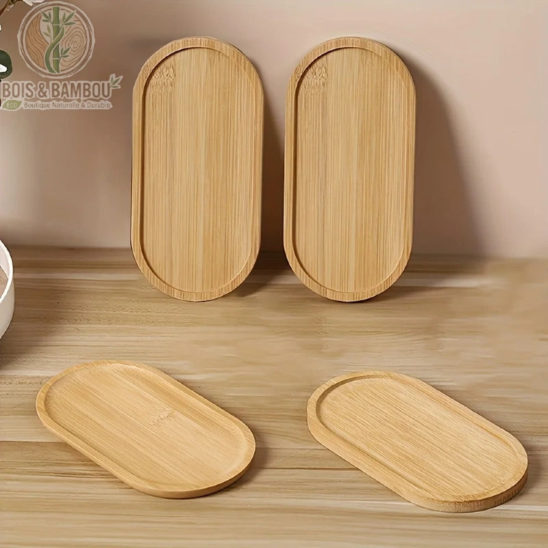 Plateau decoratif bambou ovale set 4 pieces debout et a plat en situation sur surface bois naturel, Bois et Bambou Eco.
