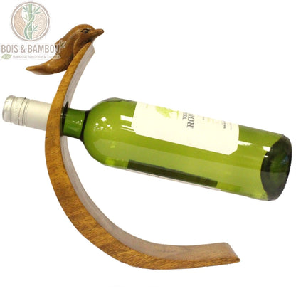 Porte-bouteille en équilibre bois brun sculpté dauphin avec bouteille de vin, vue de profil Bois Et Bambou Eco
