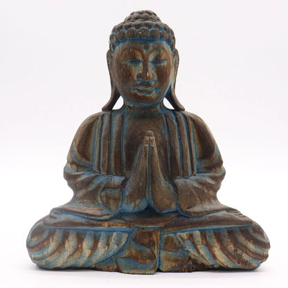 Statue de Bouddha en bois d'albasia bleu, mains jointes, vue de face sur fond blanc